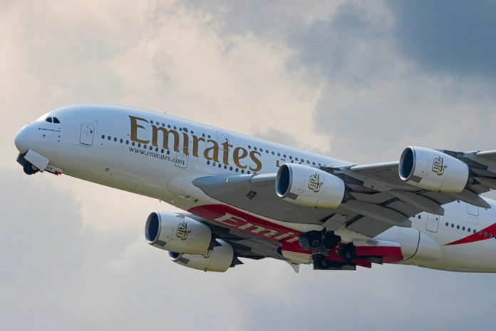 An Emirates plane mid-flight