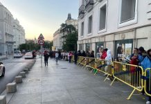Mexican nationals wait in line in Madrid to cast their vote in person for the country's first female president
